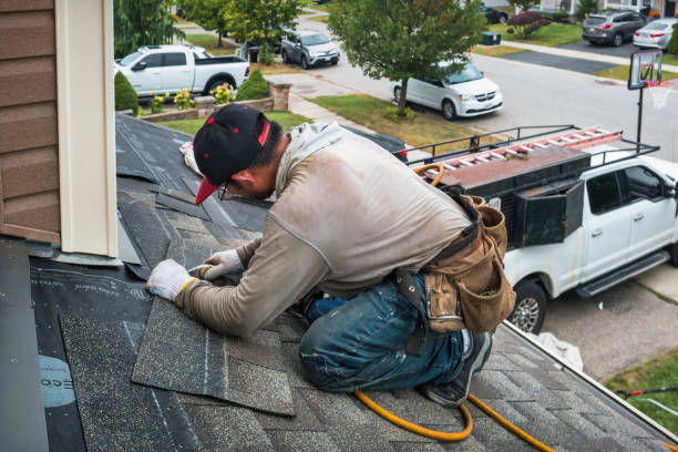 Professional Roofing technician working in East Fairfield, VT